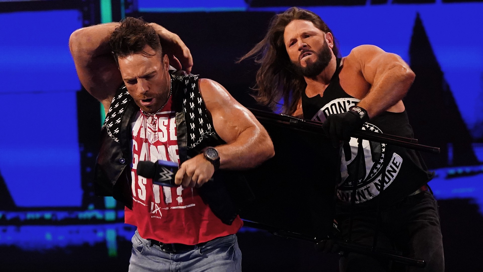 LA Knight AJ Styles
