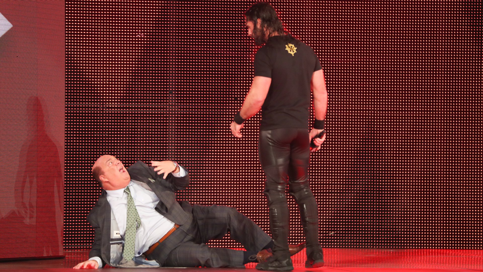 Paul Heyman e Seth Rollins